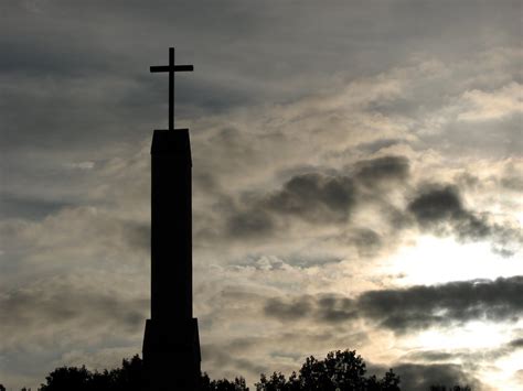 Cross silhouette against the sky